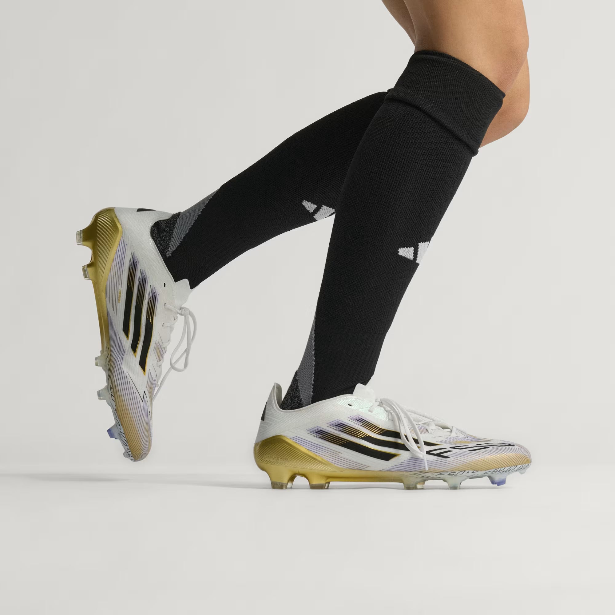 F50 ELITE FIRM GROUND CLEATS